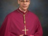 US bishop charged with failing to report abuse