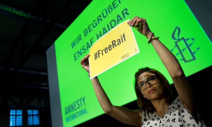 Ensaf Haidar, the wife of jailed Saudi blogger Raif Badawi, at the annual meeting of the German section of Amnesty International in Dresden, Germany on 23 May 2015. Photograph: Arno Burgi/dpa/Corbis